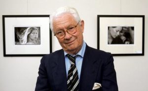 epa05647776 (FILE) A file photograph showing British photographer David Hamilton in front of two works at the exhibition 'David Hamilton - painted photography' at the gallery 'Gut Altenkamp' of ADO Gardinen in Aschendorf, Germany, 21 April 2006. Media reports on 25 November 2016 state that David Hamilton, best known for nude images of young girls, has died at his home in Paris, France at the age of 83. The cause of death at present is unknown EPA/INGO WAGNER